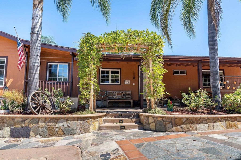 Photo of 9111 Sierra Alta Way, El Cajon, CA 92021 (MLS # 260010347)