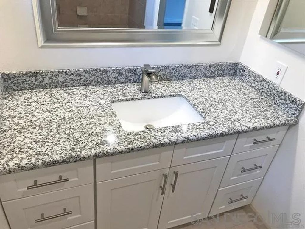 Photo of 4562 Twain Ave #13, San Diego, CA 92120 (MLS # 250046394)