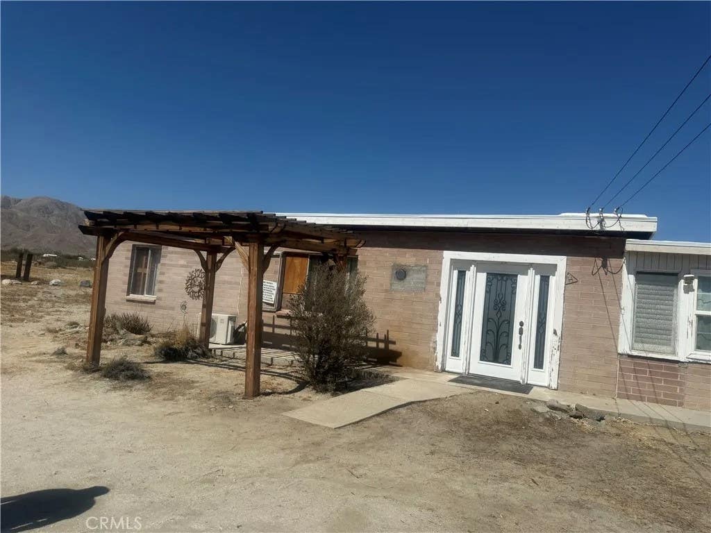 Photo of 21800 Hot Springs, Desert Hot Springs, CA 92241 (MLS # TR26123588)