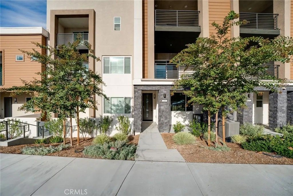 Photo of 211 Baluster, Irvine, CA 92618 (MLS # OC26011058)