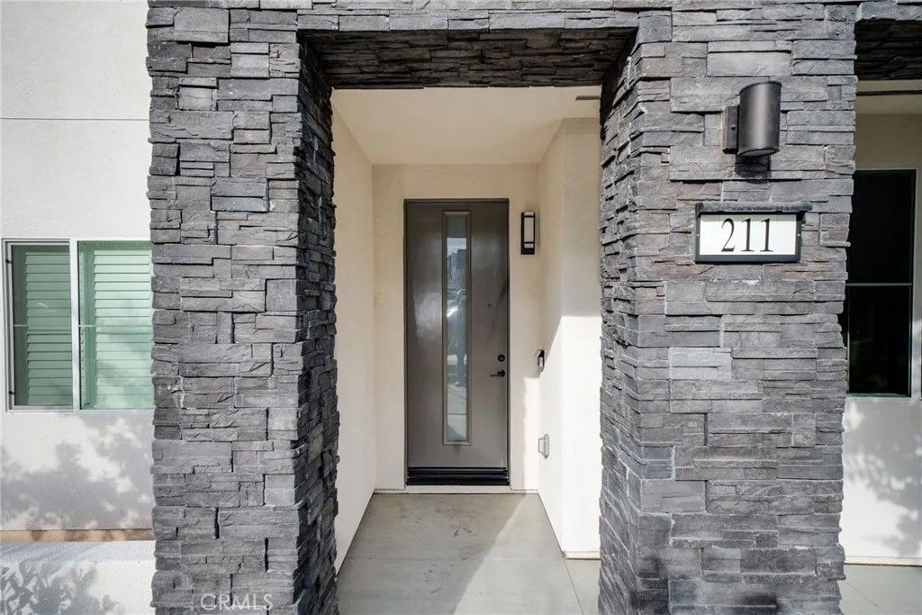 Photo of 211 Baluster, Irvine, CA 92618 (MLS # OC26011058)