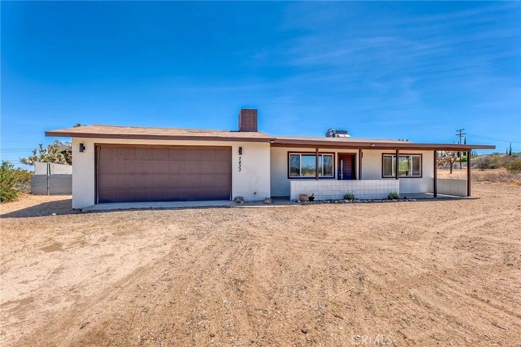 Photo of 7433 Sage Ave, Yucca Valley, CA 92284 (MLS # JT26077668)