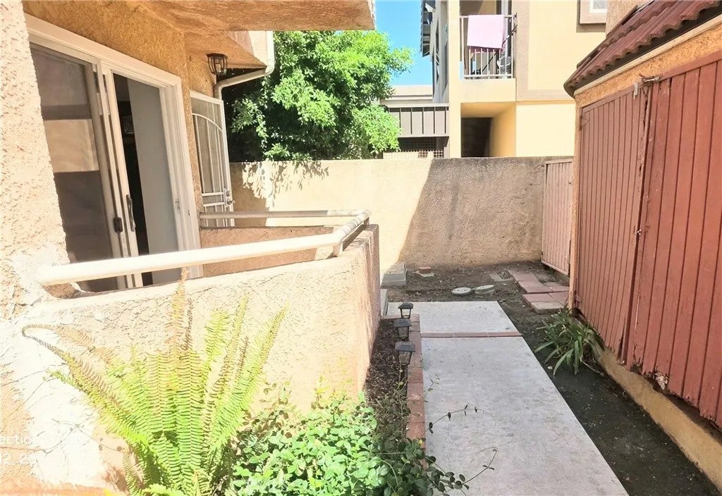 Photo of 15311 Gundry AVE #23, Paramount, CA 90723 (MLS # PW26200964)