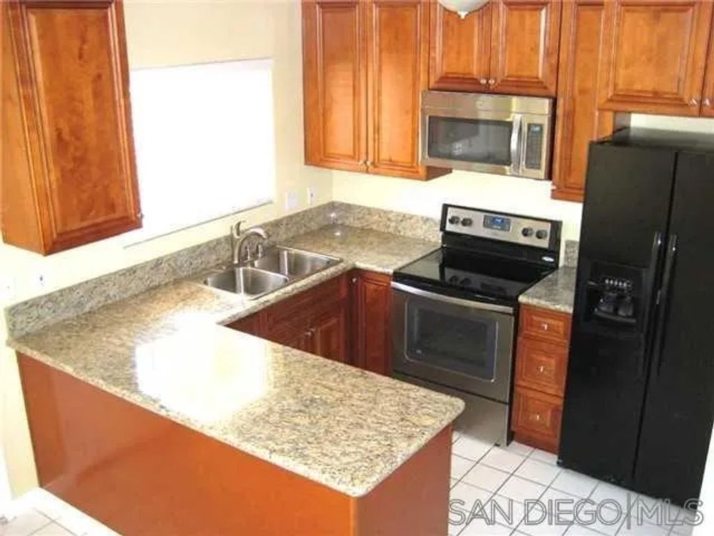 Photo of 10317 Santana Ranch Dr, Santee, CA 92071 (MLS # 260006635)