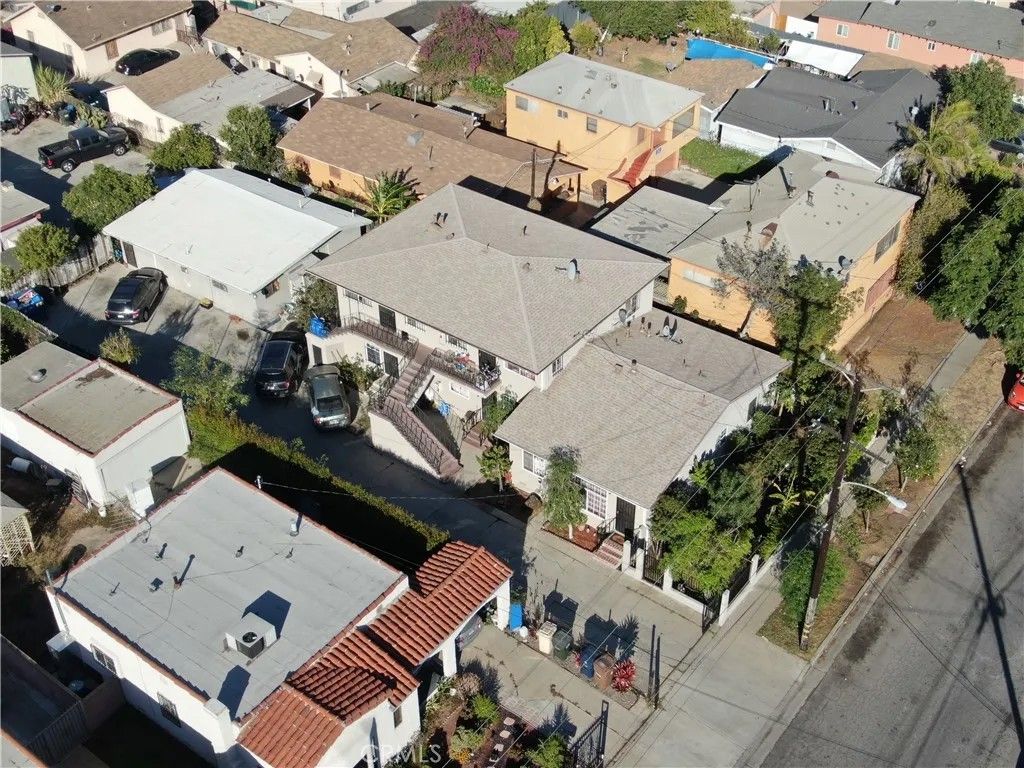 Photo of 1455 W 106th St, Los Angeles, CA 90047 (MLS # SB26089383)