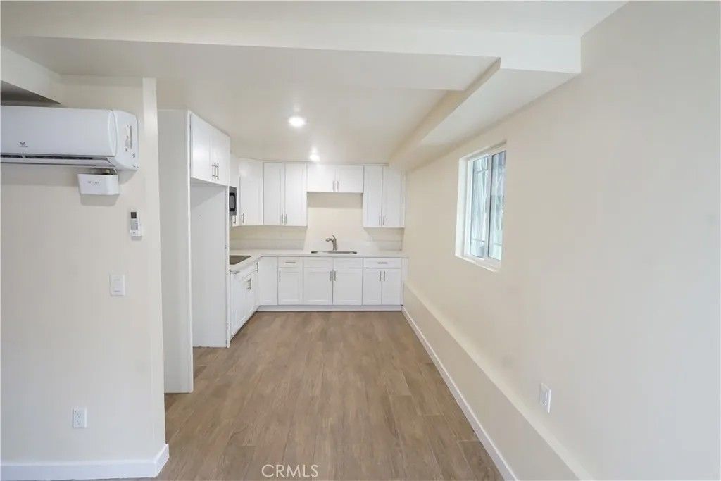 Photo of 448 W 41st Place #3/4, Los Angeles, CA 90037 (MLS # SR26041156)