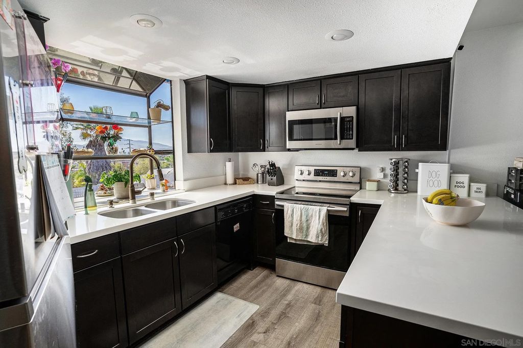 Photo of 440 Citracado Pkwy #14, Escondido, CA 92025 (MLS # 260006476)