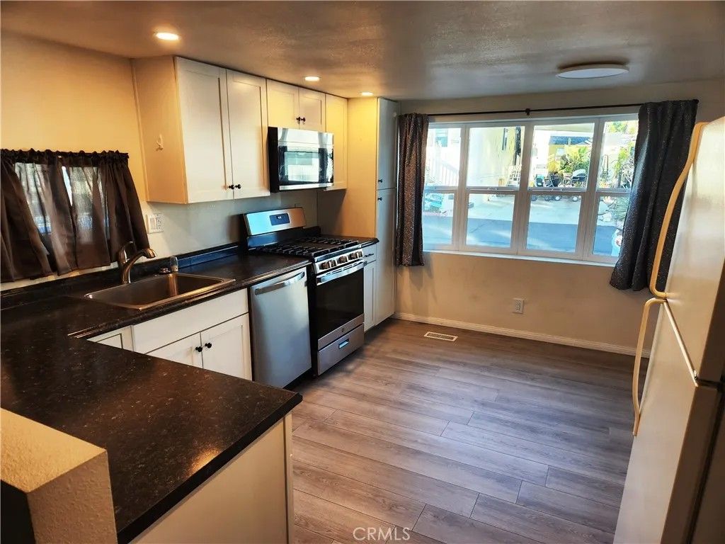 Photo of 1255 Amethyst St #21, Mentone, CA 92359 (MLS # IV26008582)