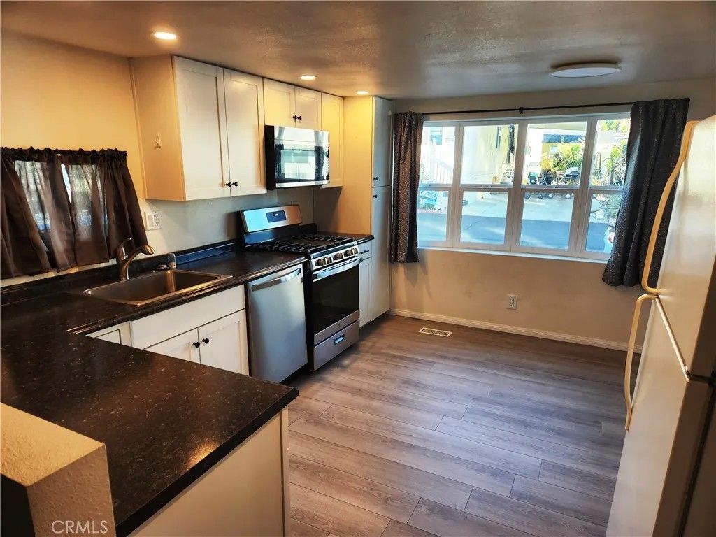 Photo of 1255 Amethyst St #21, Mentone, CA 92359 (MLS # IV26008582)