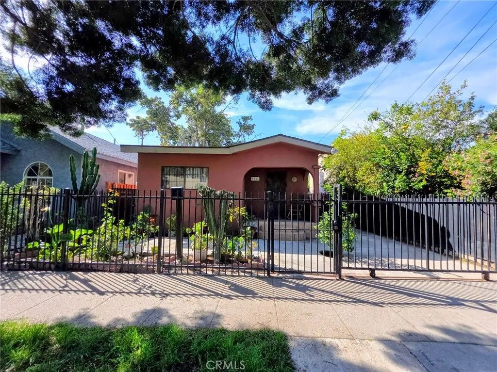 Photo of 5323 Latham St, Los Angeles, CA 90011 (MLS # NP26039480)