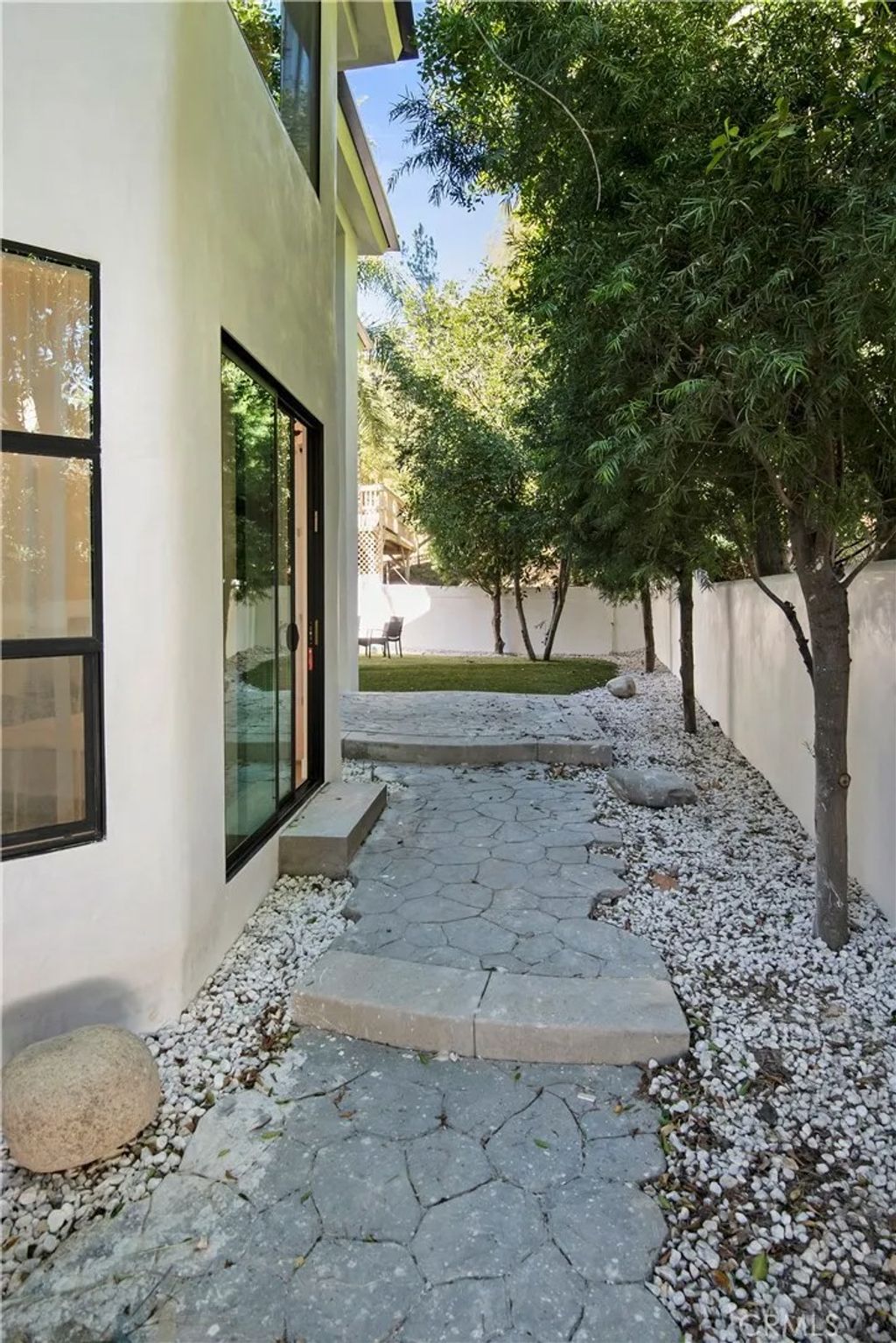 Photo of 22254 Dumetz Road, Woodland Hills, CA 91364 (MLS # SR25277807)