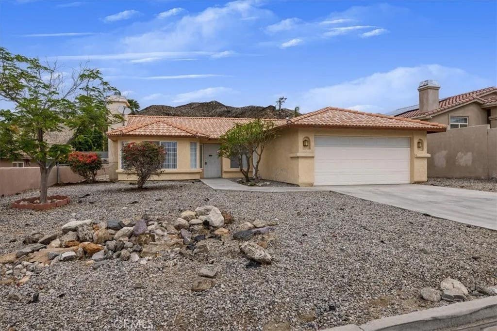 Photo of 66144 Avenida Cadena, Desert Hot Springs, CA 92240 (MLS # TR26117824)