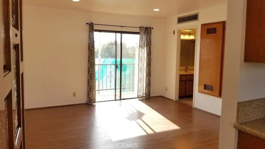 Photo of 77 N HOLLISTON Avenue, Pasadena, CA 91106 (MLS # TR26000243)