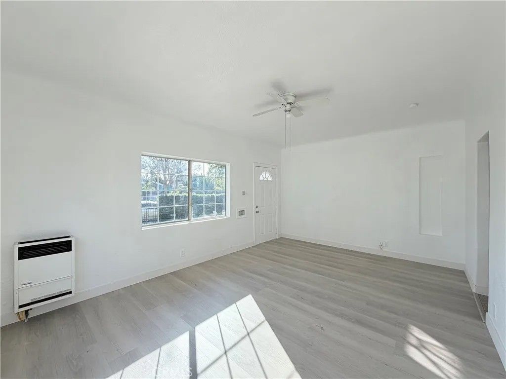 Photo of 707 Harding Ave, Los Angeles, CA 90022 (MLS # TR26031762)