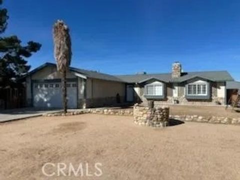 Photo of 10970 Merino Ave, Apple Valley, CA 92308 (MLS # HD26059180)