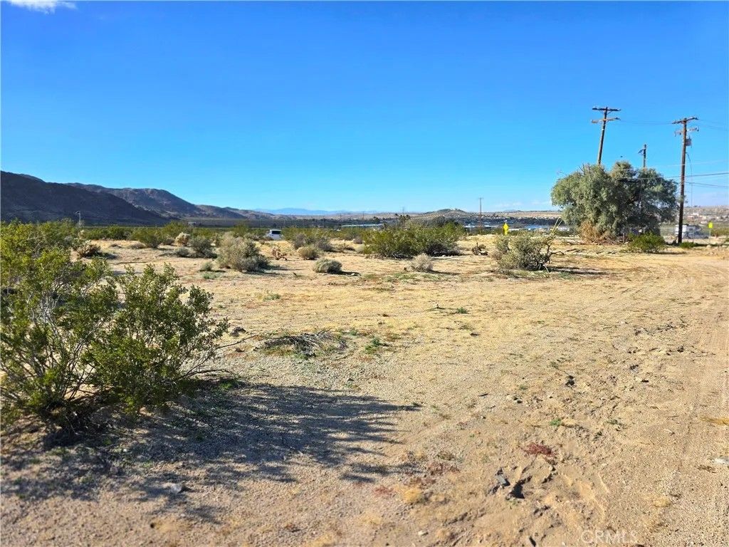 Photo of 7335 Utah Trl, 29 Palms, CA 92277 (MLS # JT26004854)