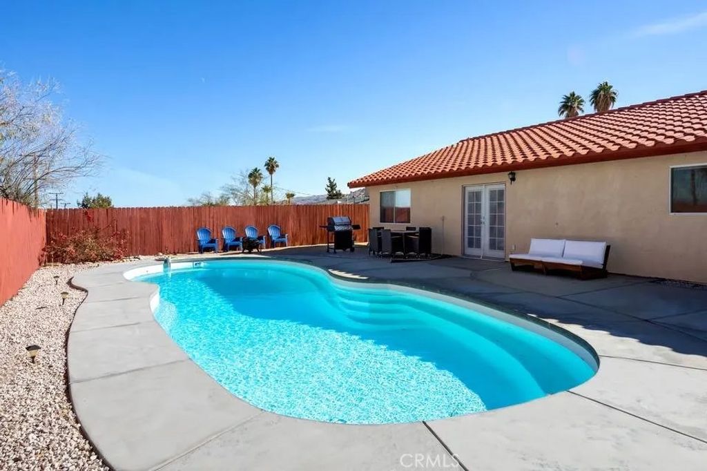 Photo of 71620 Juanita Drive, 29 Palms, CA 92277 (MLS # JT25275978)