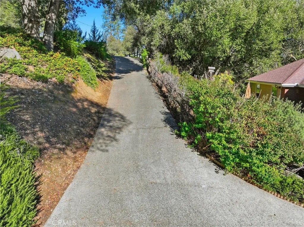 Photo of 39309 Forest Park Lane, Oakhurst, CA 93644 (MLS # FR26009951)