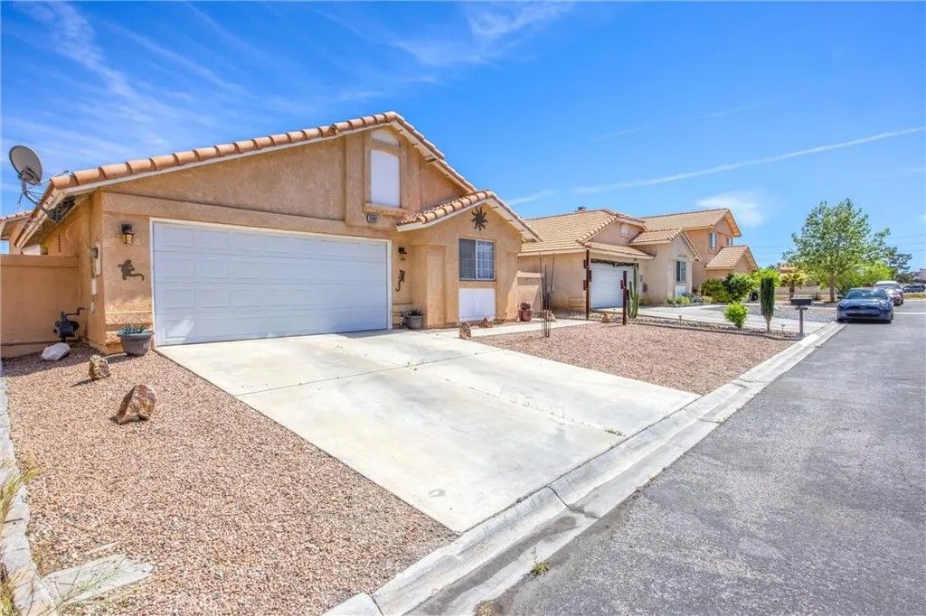 Photo of 12441 Datewood Ln, Victorville, CA 92395 (MLS # HD26064104)