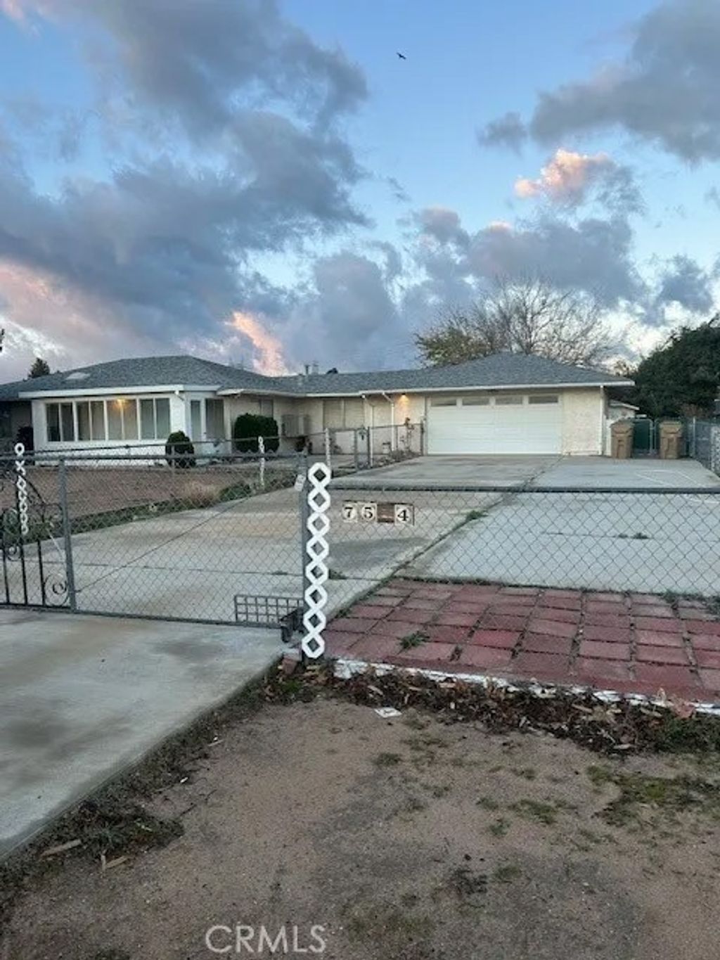 Photo of 7544 Oakwood Avenue, Hesperia, CA 92345 (MLS # IV26004577)