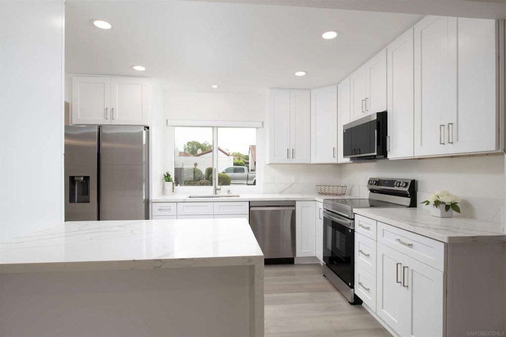 Photo of 16450 Caminito Vecinos #106, San Diego, CA 92128 (MLS # 260009111)