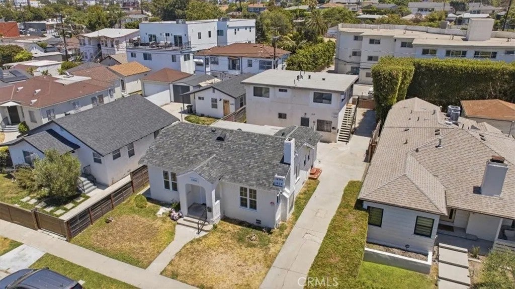 Photo of 1636 S Ridgeley DR, Los Angeles, CA 90019 (MLS # SW26131788)