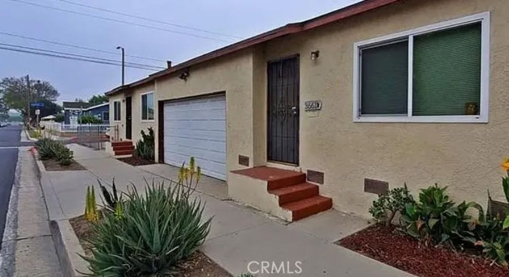 Photo of 3661 Webster AVE, Long Beach, CA 90810 (MLS # PW26096704)