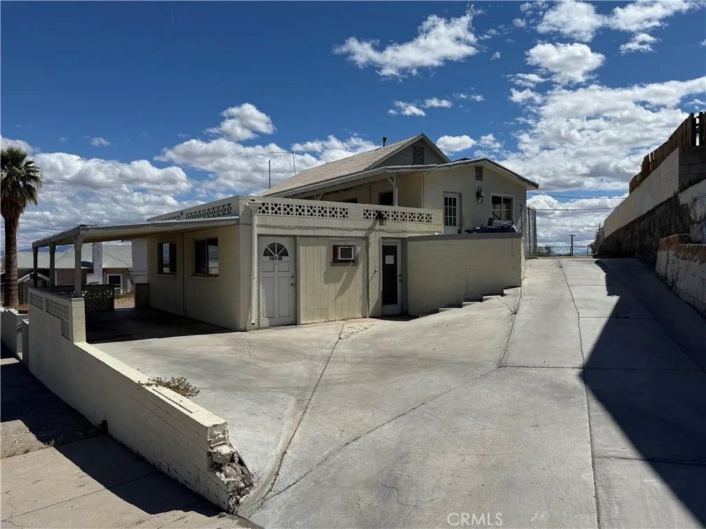 Photo of 323 E St, Needles, CA 92363 (MLS # JT26078752)