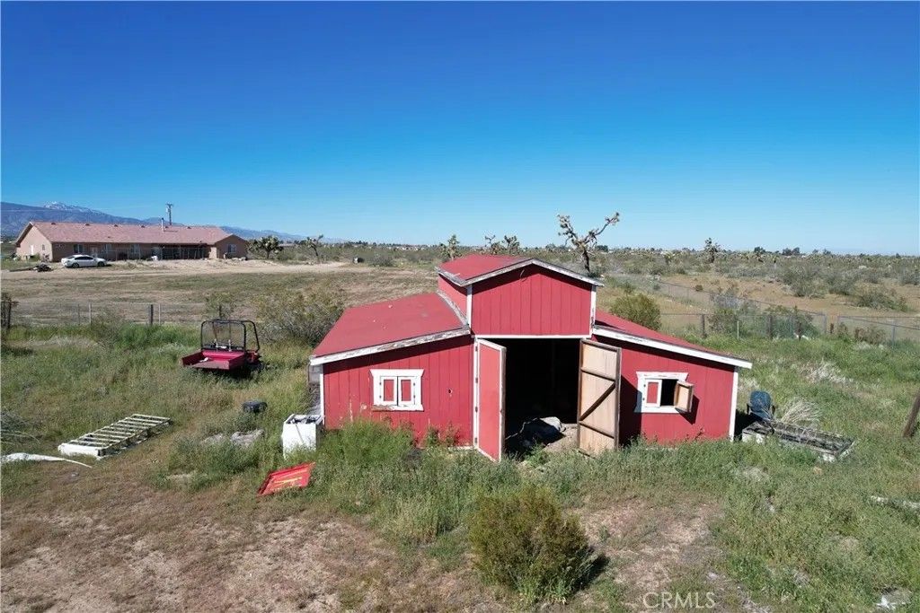 Photo of 12324 Eaby Rd, Phelan, CA 92371 (MLS # CV26082094)