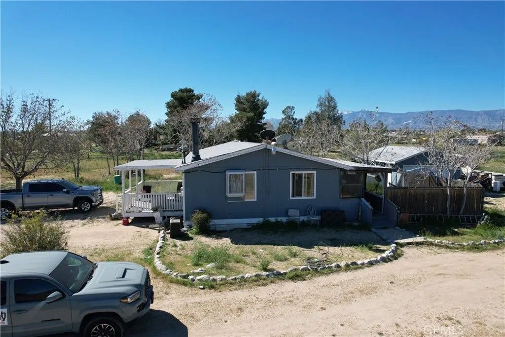 Photo of 12324 Eaby Rd, Phelan, CA 92371 (MLS # CV26082094)