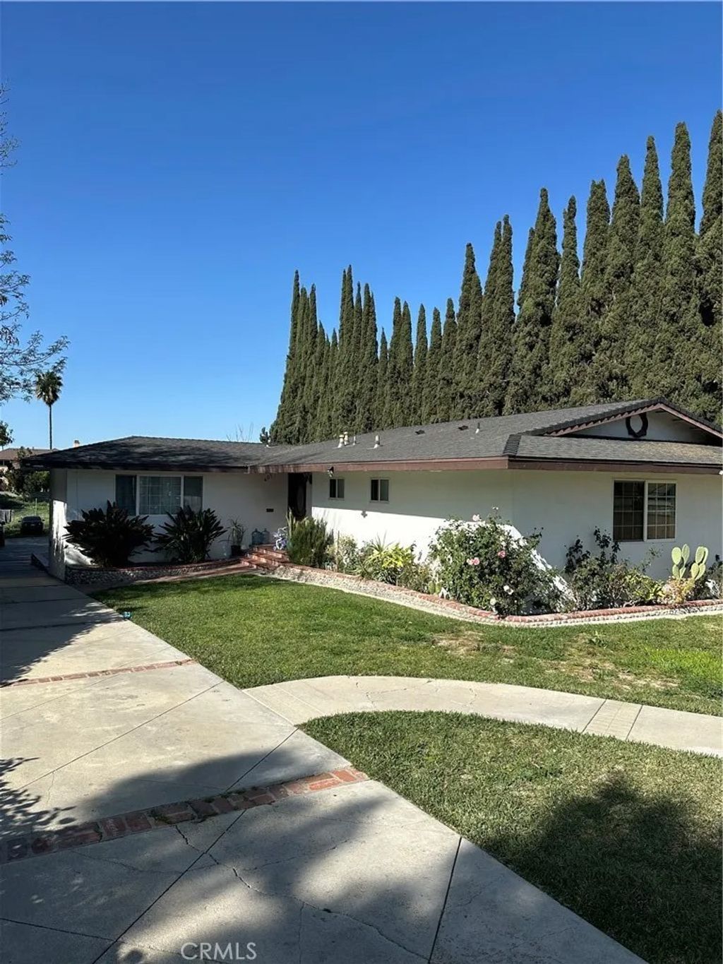 Photo of 405 S 3rd Ave, La Puente, CA 91746 (MLS # CV26030636)