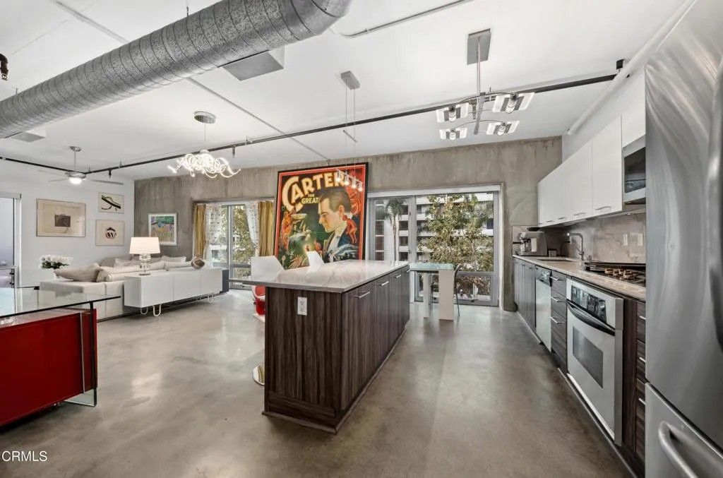 Photo of 645 W 9th Street #200, Los Angeles, CA 90015 (MLS # P1-25688)