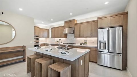 Photo of 924 Chinon, Irvine, CA 92618 (MLS # OC26057438)