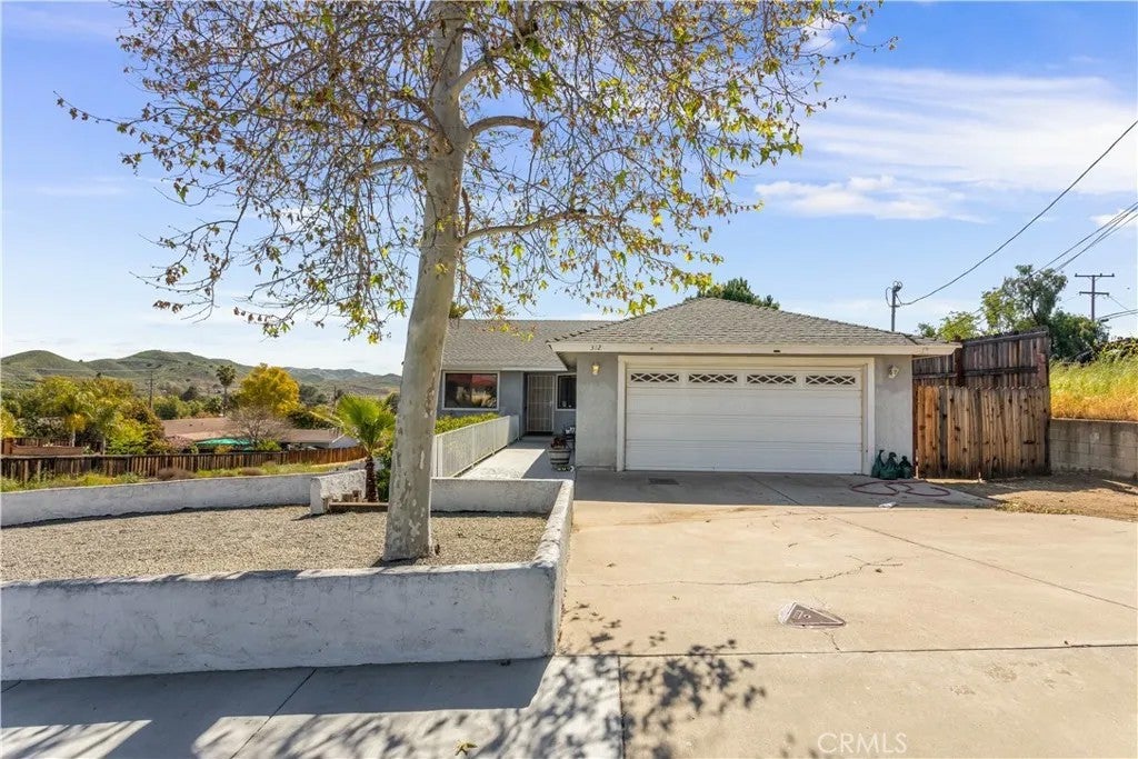 Photo of 312 N Lewis ST, Lake Elsinore, CA 92530 (MLS # IV26184819)