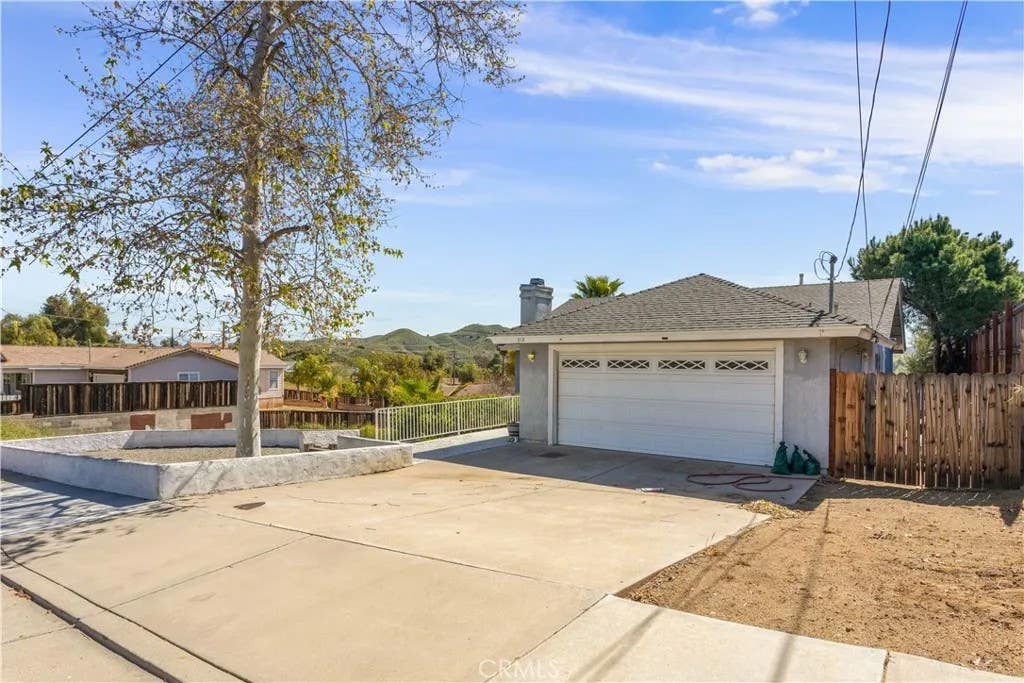 Photo of 312 N Lewis ST, Lake Elsinore, CA 92530 (MLS # IV26184819)