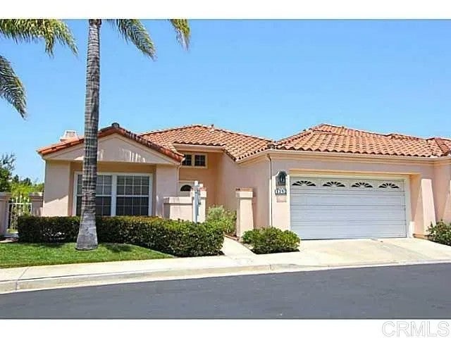 Photo of 1242 Rue Saint Moritz, San Marcos, CA 92078 (MLS # NDP2609276)