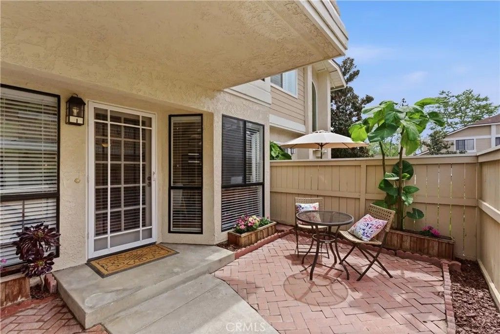 Photo of 7735 Briarglen Loop #i, Stanton, CA 90680 (MLS # OC26067797)