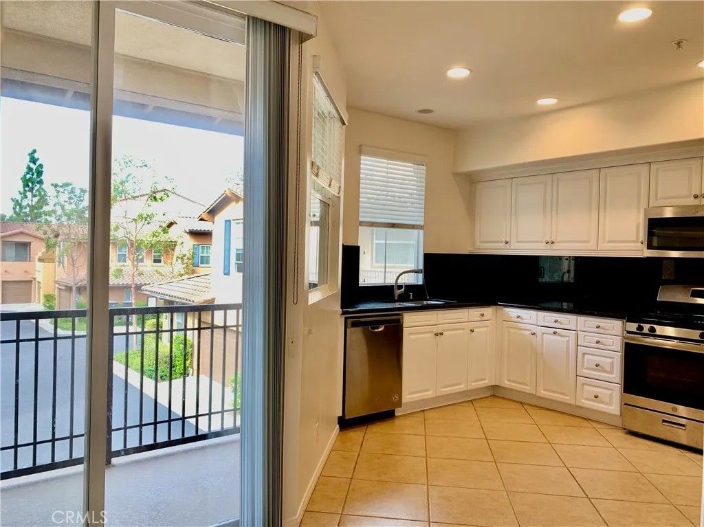 Photo of 131 Stepping Stone, Irvine, CA 92603 (MLS # OC25278125)