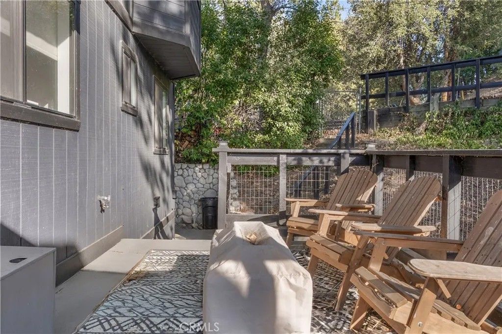 Photo of 290 Davos Drive, Crestline, CA 92325 (MLS # CV25273632)