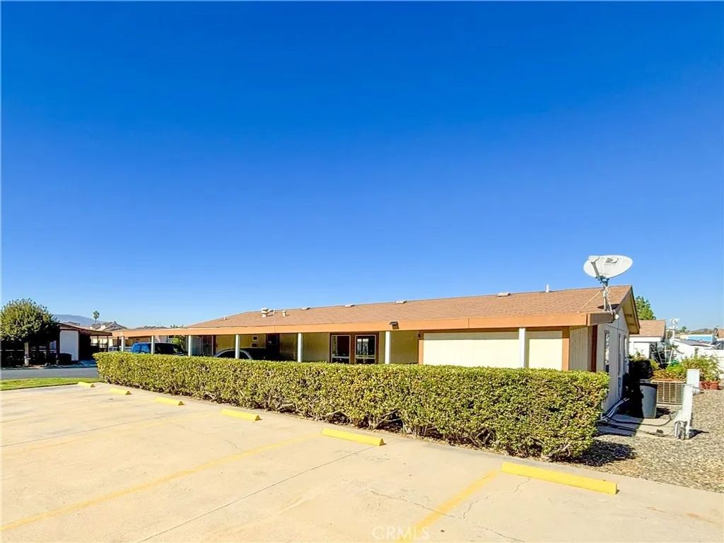 Photo of 13381 Magnolia Ave #102, Corona, CA 92879 (MLS # OC25247225)