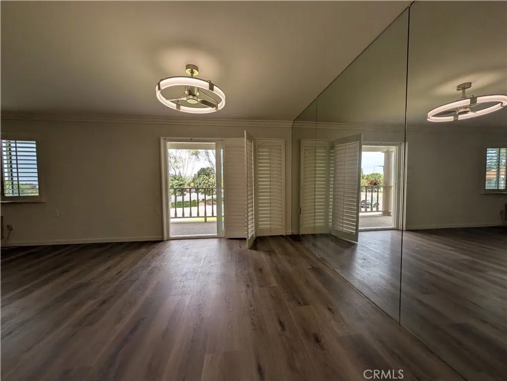 Photo of 3498 Bahia Blanca #2B, Laguna Woods, CA 92637 (MLS # OC26090033)