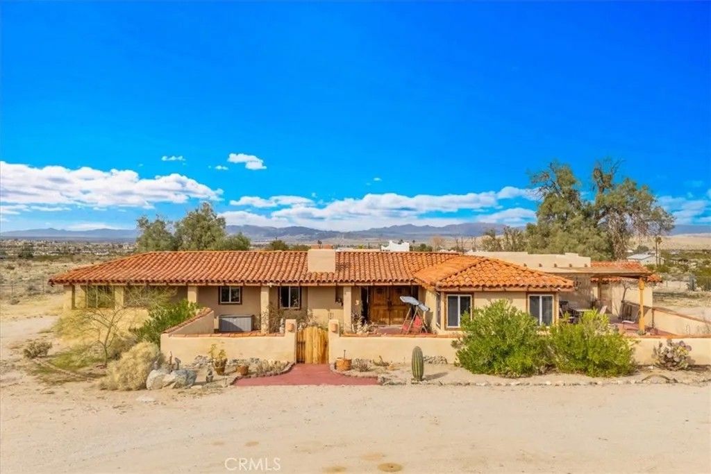 Photo of 74784 Foothill Drive, 29 Palms, CA 92277 (MLS # JT26032681)