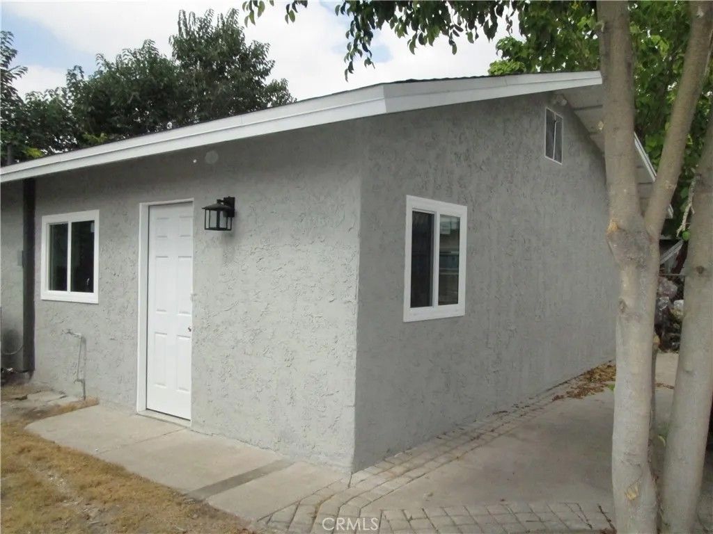 Photo of 852 Davidson Avenue #1/2, San Bernardino, CA 92411 (MLS # CV25267071)