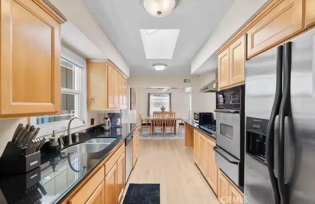 Photo of 10221 Roselee Dr, Garden Grove, CA 92840 (MLS # PW26015281)