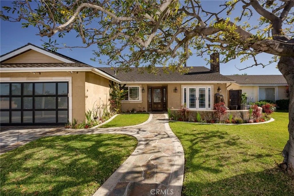 Photo of 8562 Sandy Hook Dr, Huntington Beach, CA 92646 (MLS # OC26083491)