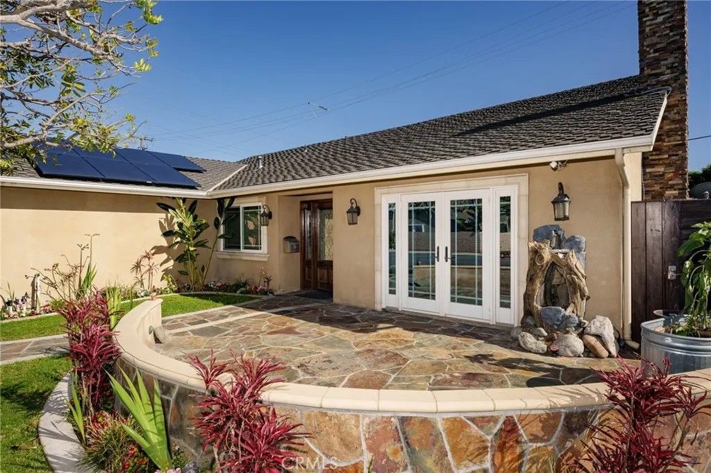 Photo of 8562 Sandy Hook Dr, Huntington Beach, CA 92646 (MLS # OC26083491)