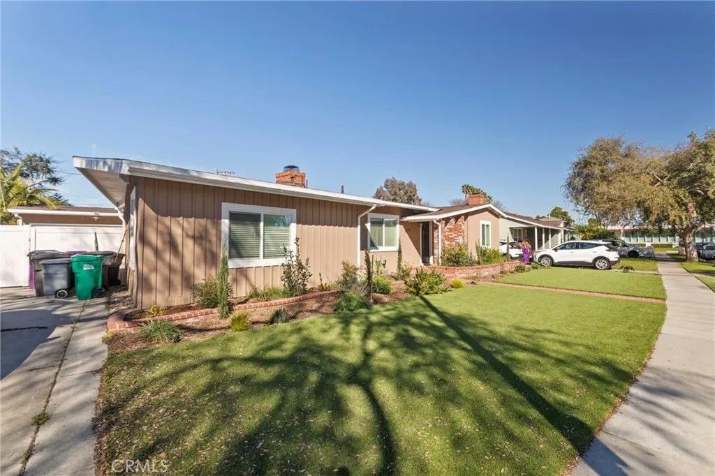 Photo of 5741 E 23rd St, Long Beach, CA 90815 (MLS # OC26007108)