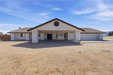 Photo of 10707 Mines Ranch Rd, Victorville, CA 92392 (MLS # HD26056979)