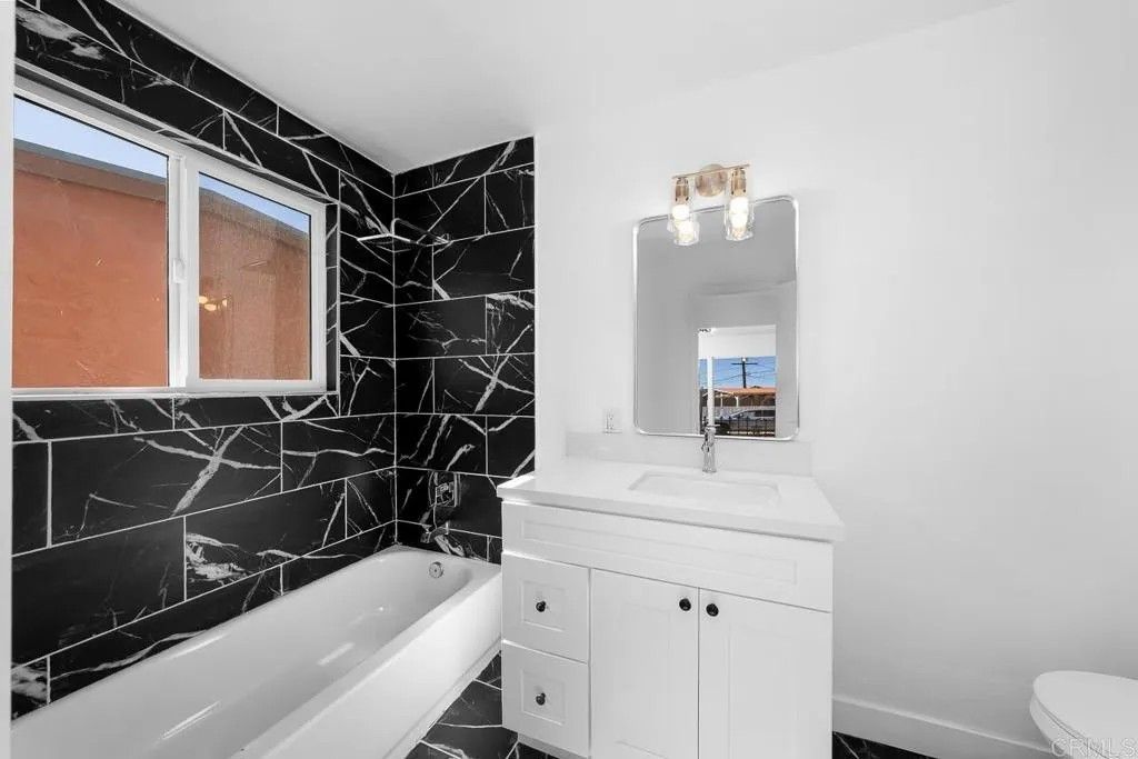 Photo of 2537 Tuberose Street, San Diego, CA 92105 (MLS # PTP2507910)