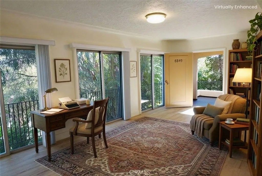 Photo of 6845 Alta Loma Terrace, Los Angeles, CA 90068 (MLS # GD26000687)